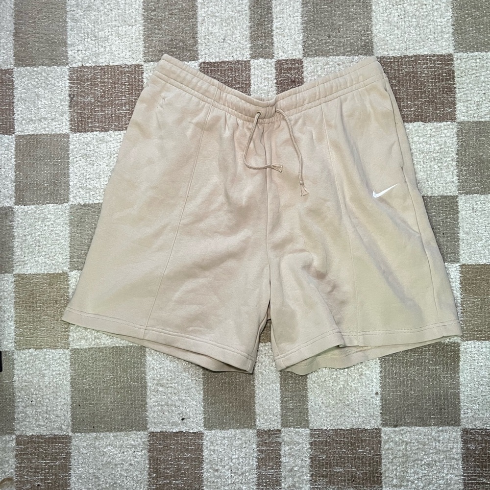 Nike Women's Beige Athletic Shorts with White Swoosh